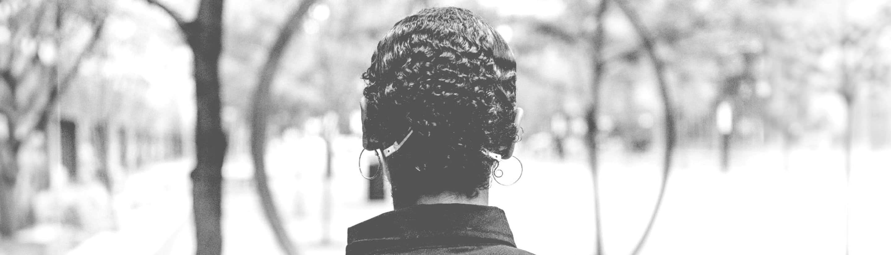 A woman standing backwards