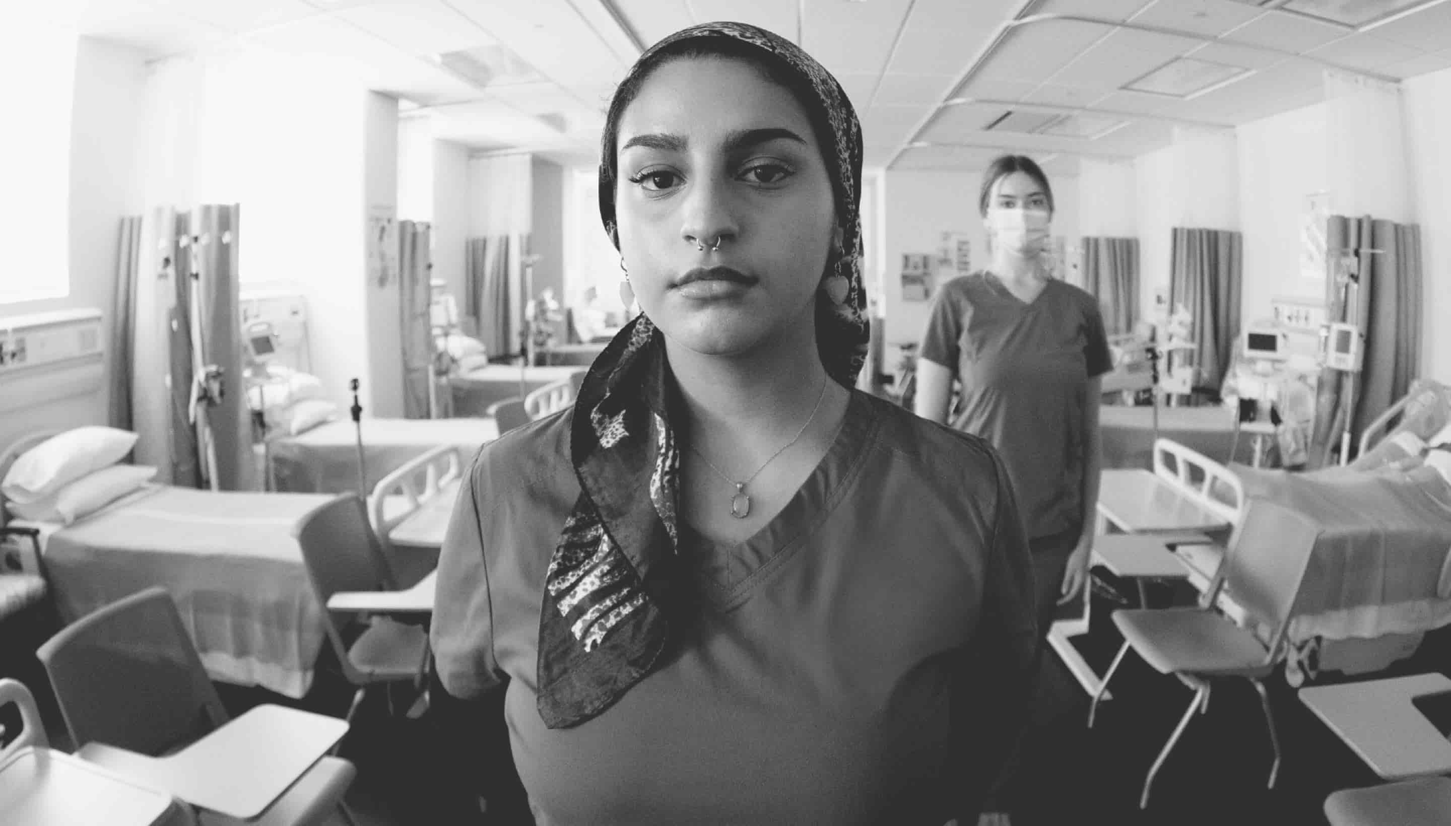 A nurse looking directly in the camera