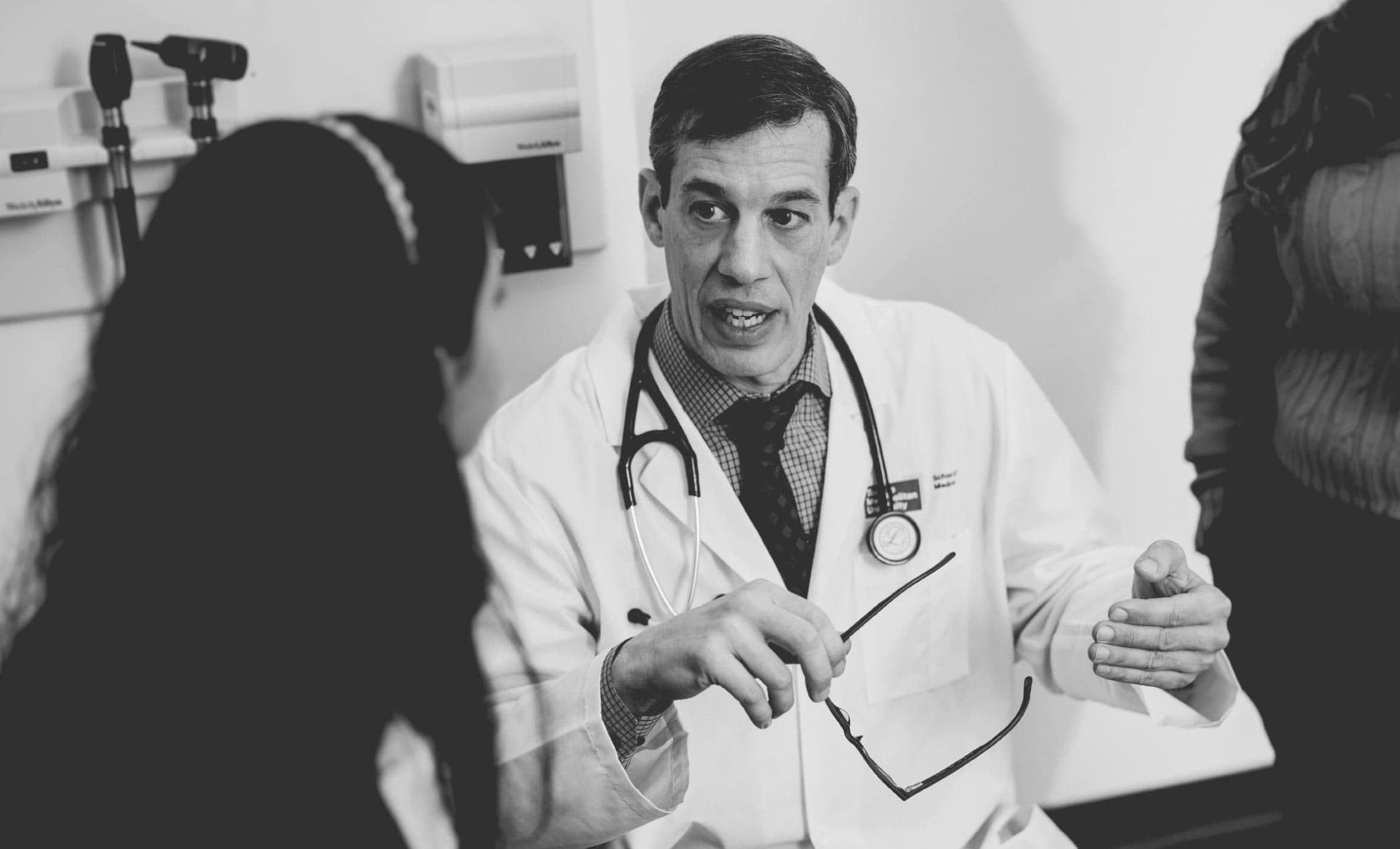 A doctor talking to a patient