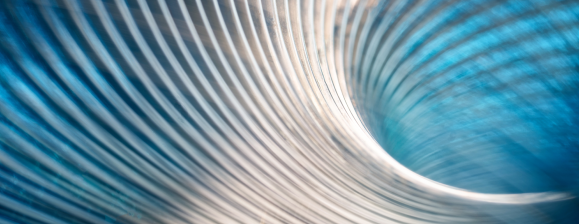 An abstract, high-key digital composition featuring a series of metallic, silver-toned curved ribs that spiral inward toward a central vortex.