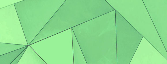 An abstract geometric pattern consisting of various interlocking triangles in shades of light and mint green.