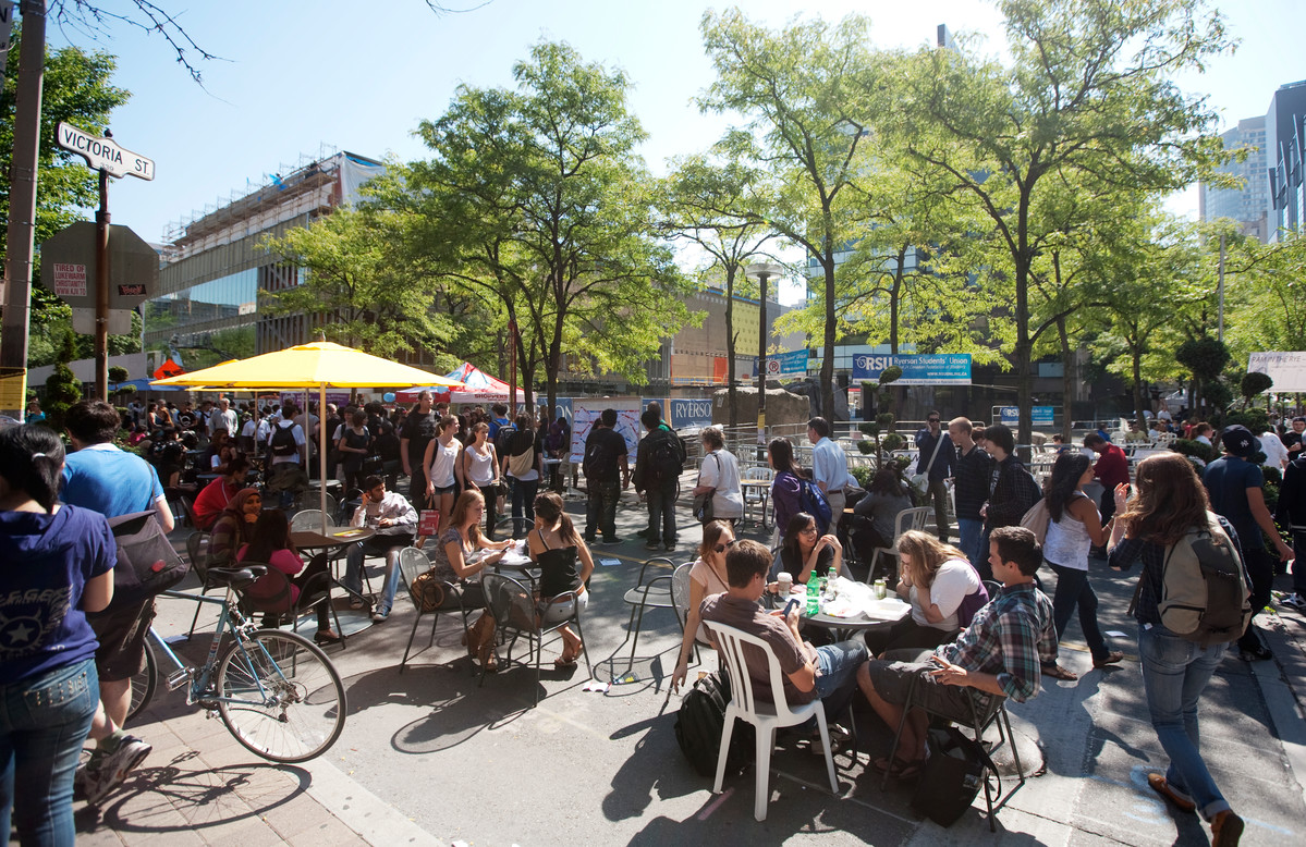 TMU campus on a busy sunny day.