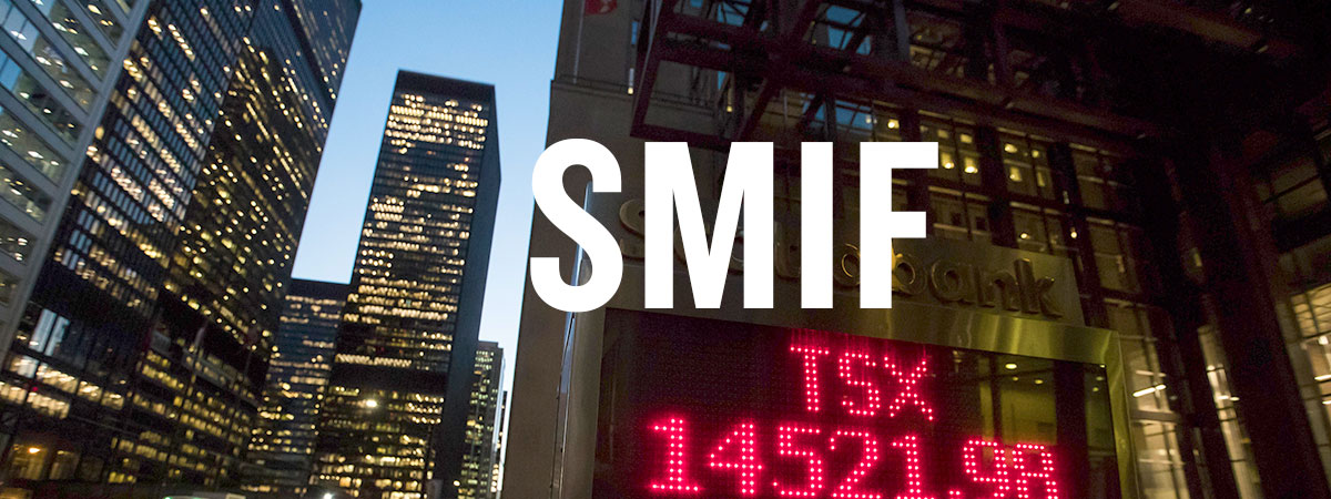 SMIF banner with TSX sign on Bay Street at nigth