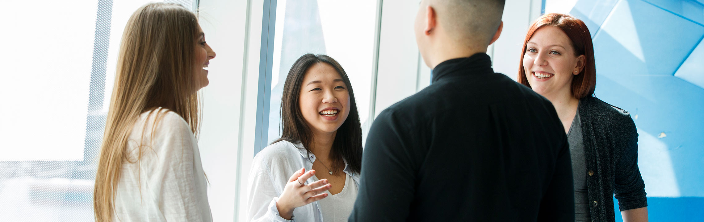 Students talking to each other at the SLC