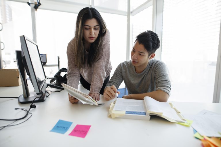 Two students working on an assignement together