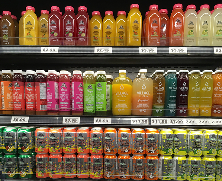 image of refrigerated healthy drink isle in a grocery store