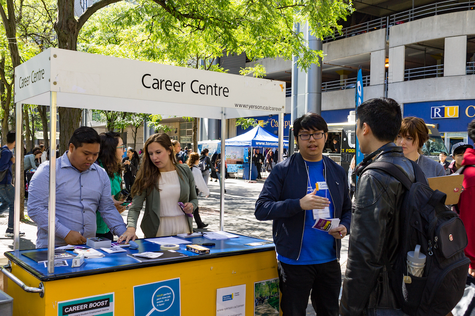 Photo of students interacting with Career Centre booth during first week of fall school year