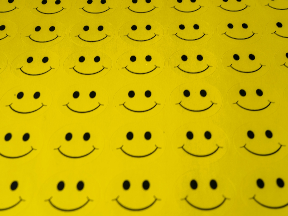 Sheet of yellow smiley face stickers