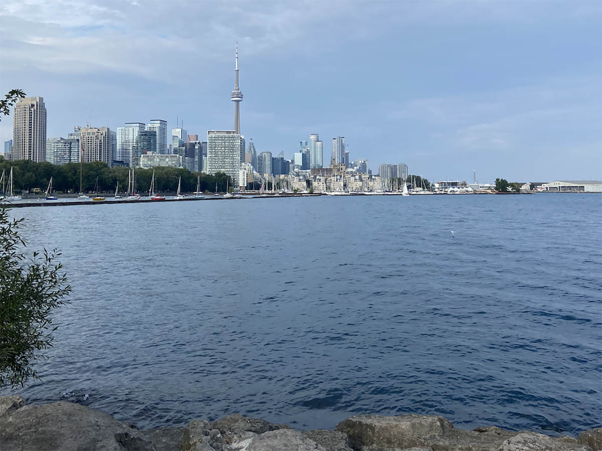 A view of the Toronto city skyline from the west facing east is seen from Trillium Park