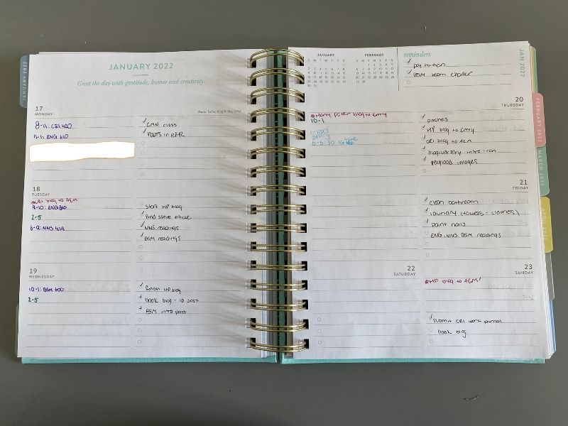 My weekly planner for the week of January 17 to January 23, 2022. There are class times, work hours and to do lists scribbled under each day. 