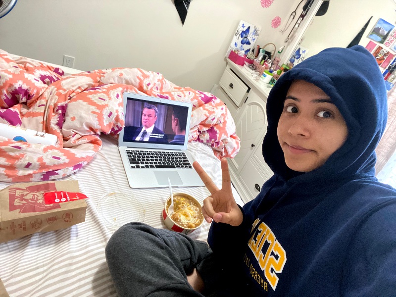 Nishka eating while watching TV