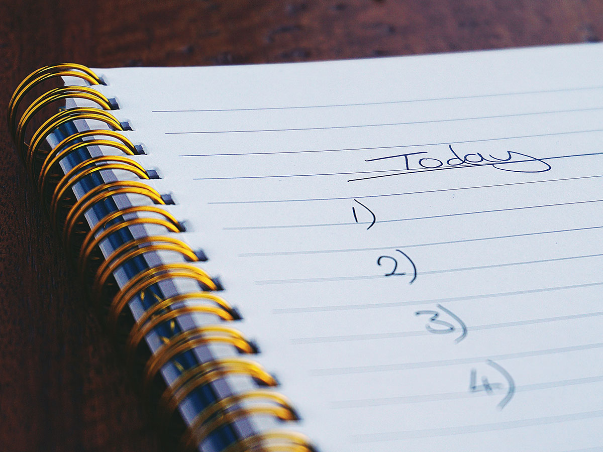 A to-do list labelled "Today" in a spiral notebook with lined paper.