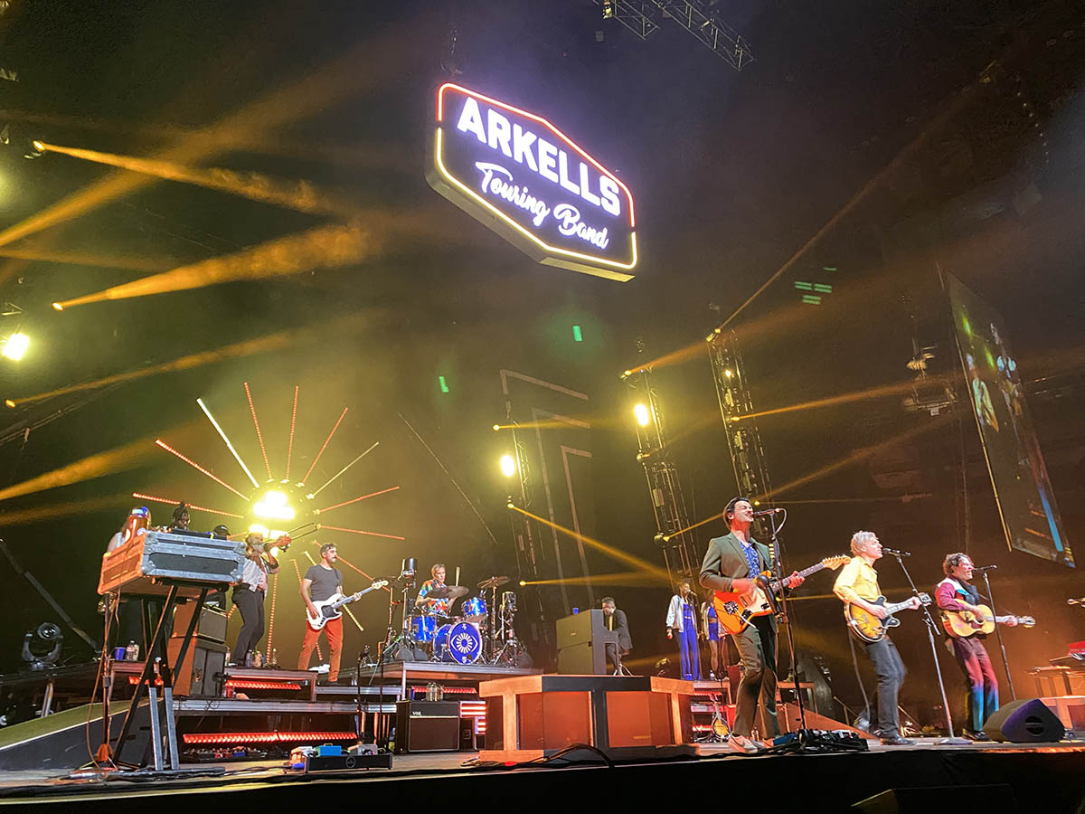 The Arkells performing at a concert.