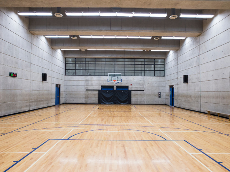Inside the Recreation and Athletic Centre's basketball court.