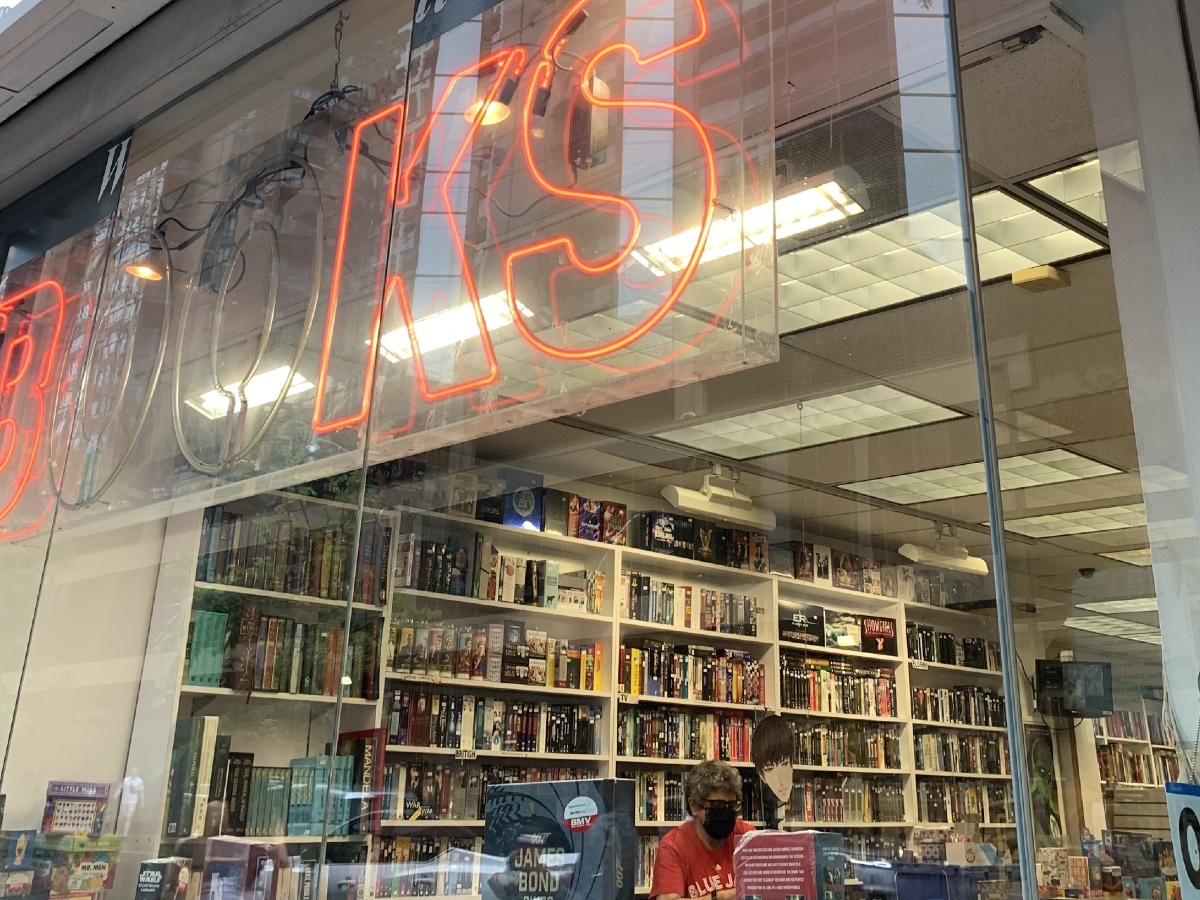 Outside the window display of a shop named BMV books.