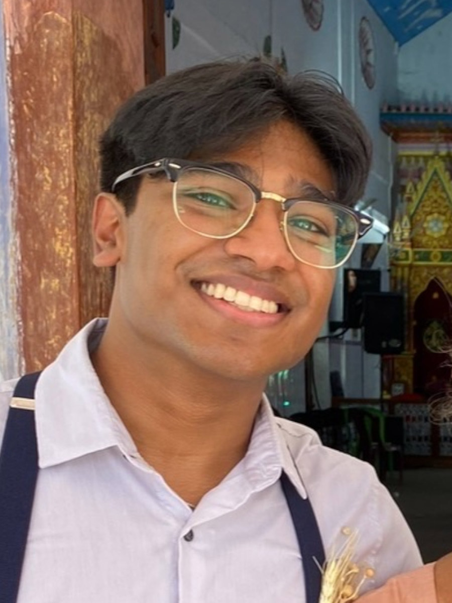 Kevin smiles at the camera