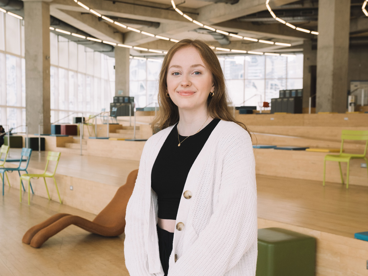 Claire smiling at the camera in the SLC.