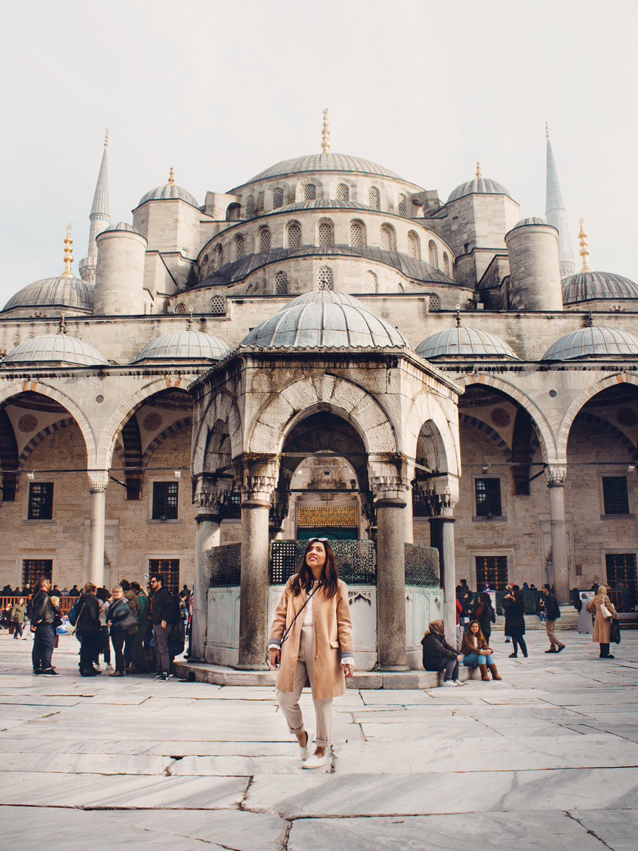 An exchange student looks up in wonder at the Hagia Sophia Grand Mosque in Istanbul.