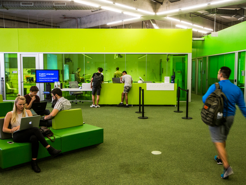 Students hanging out on the 4th floor of the SLC.