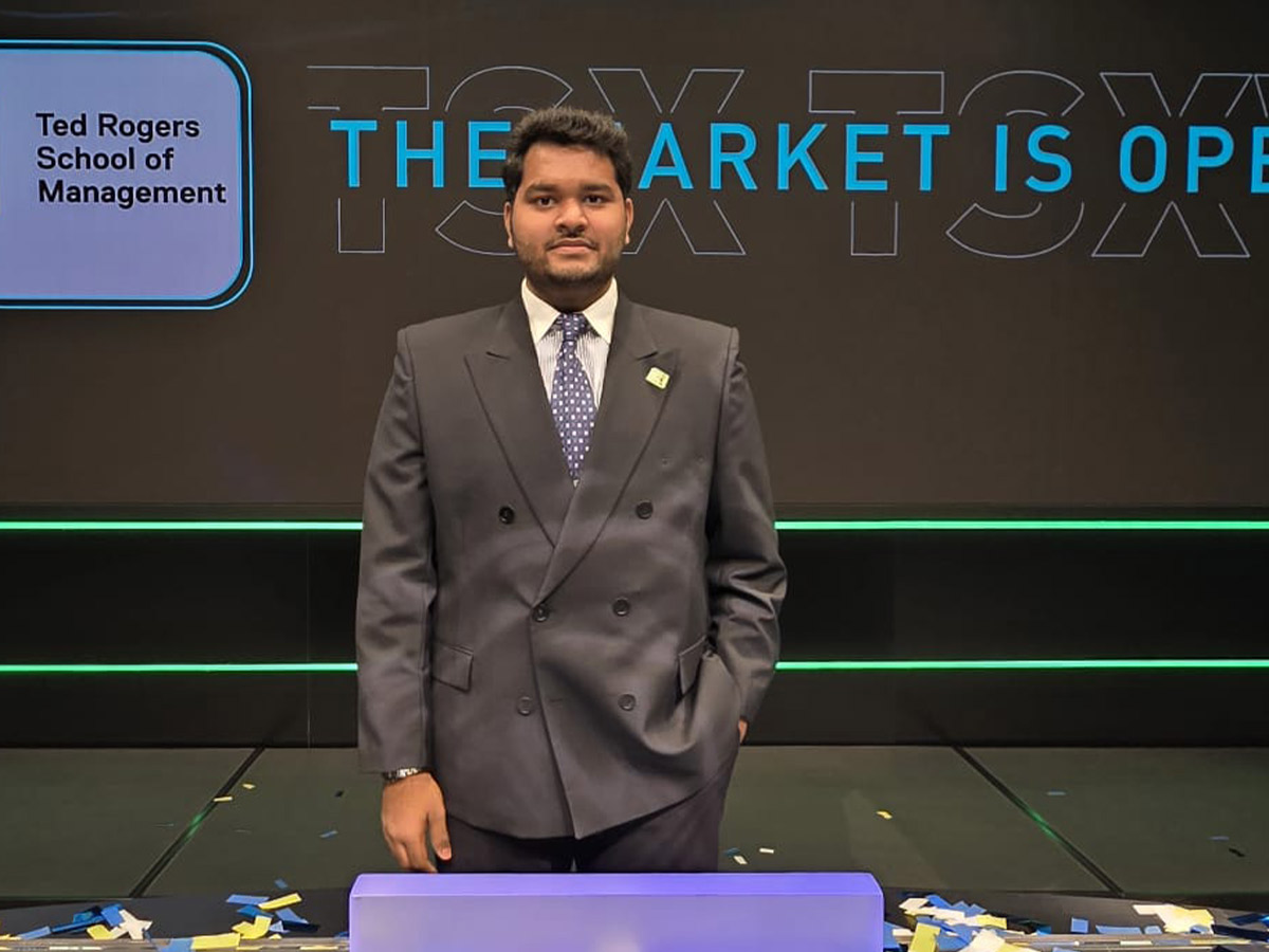 Latif wears a suit at the Toronto Stock Exchange (TSX) opening.