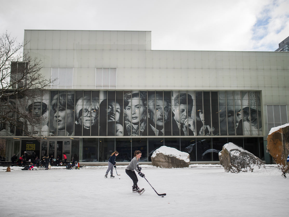 Hockey players skate on the frozen Lake Devo.
