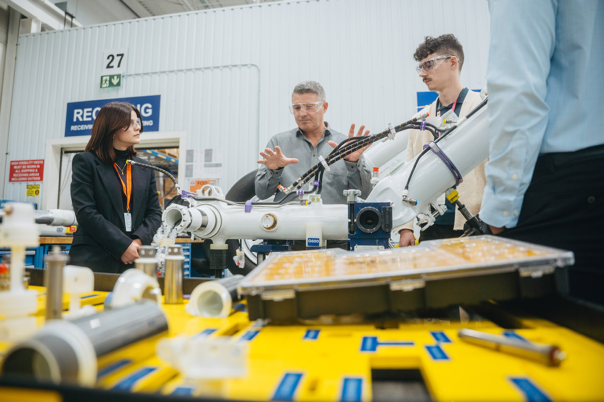 Professor and Students working in the lab