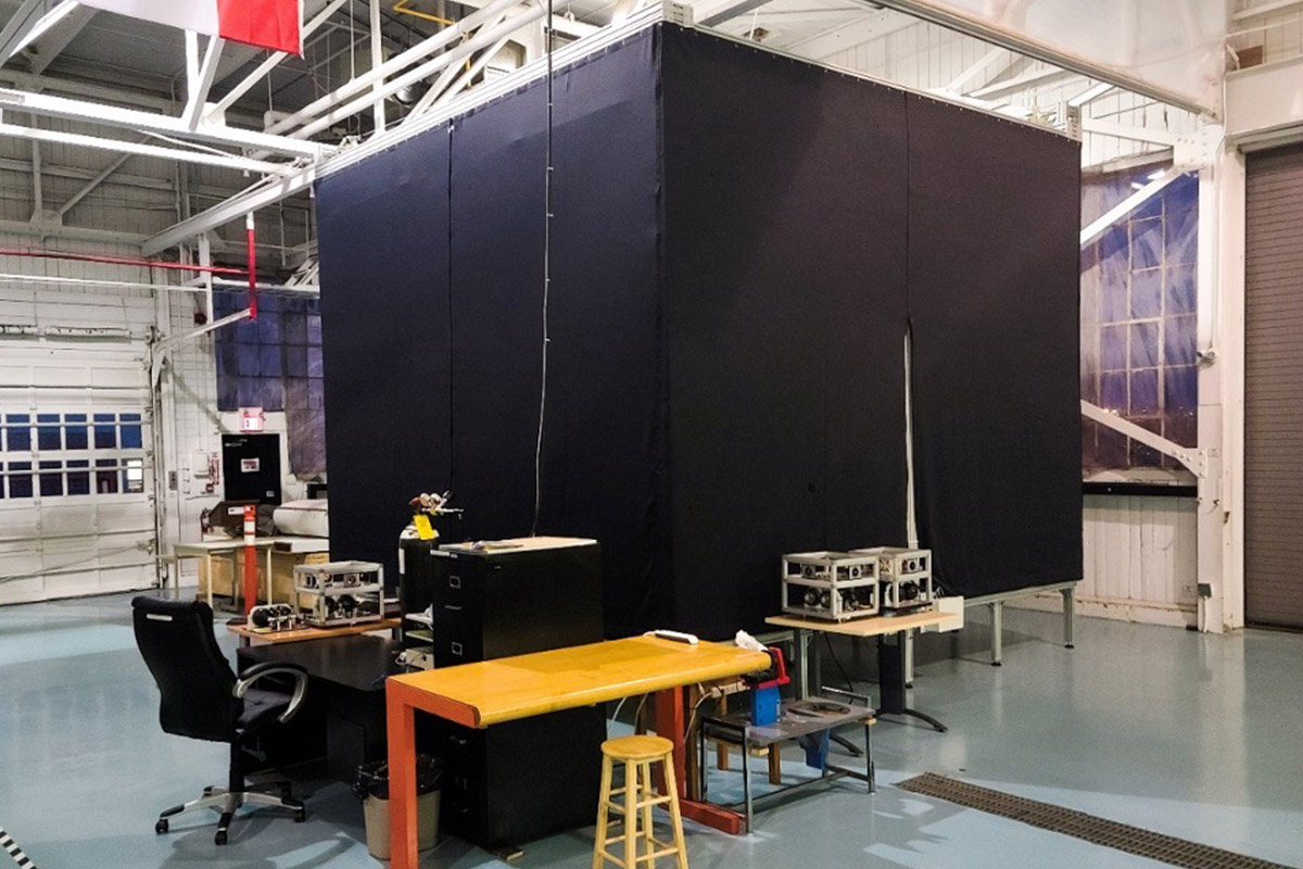 Flat table (2D frictionless space simulation testbed) used for performing experiments in autonomous inspection, servicing, and assembly of large space structures.