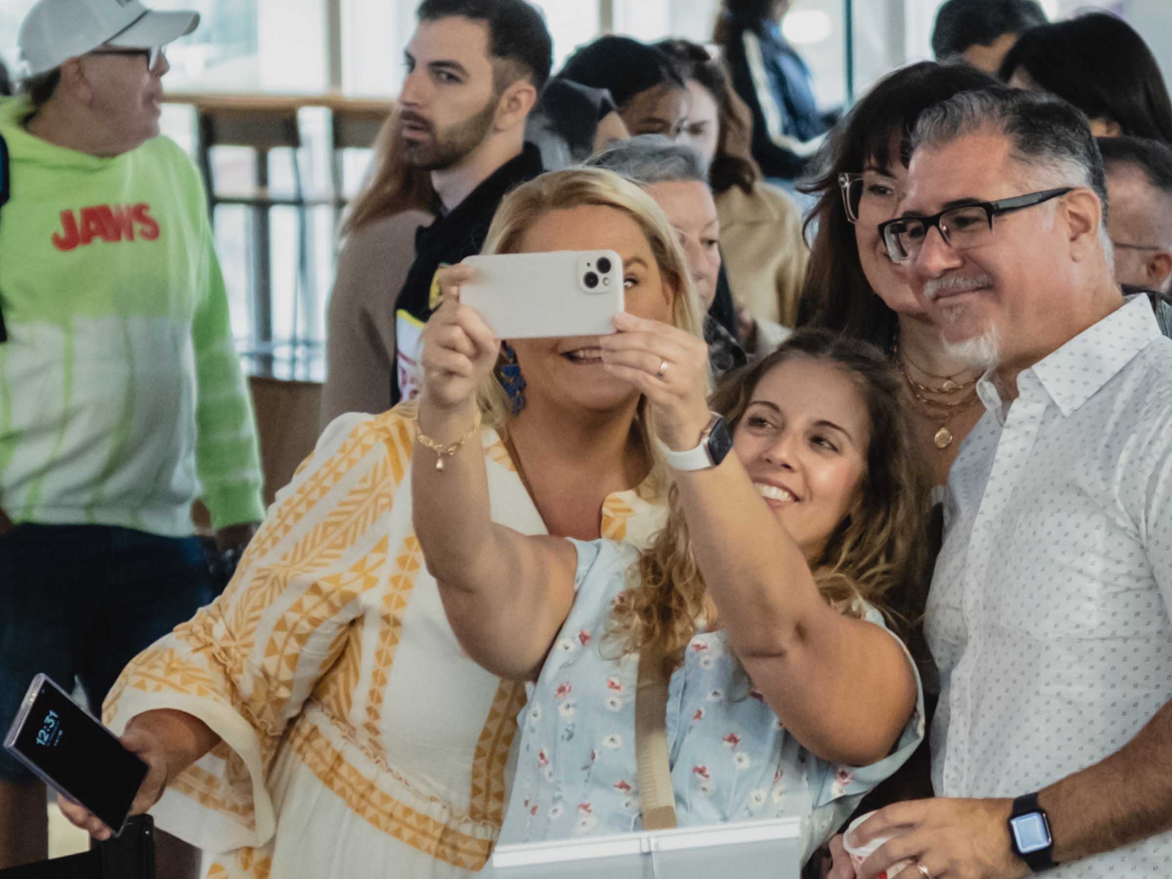 TMU alumni taking a selfie at Alumni Reunion registration