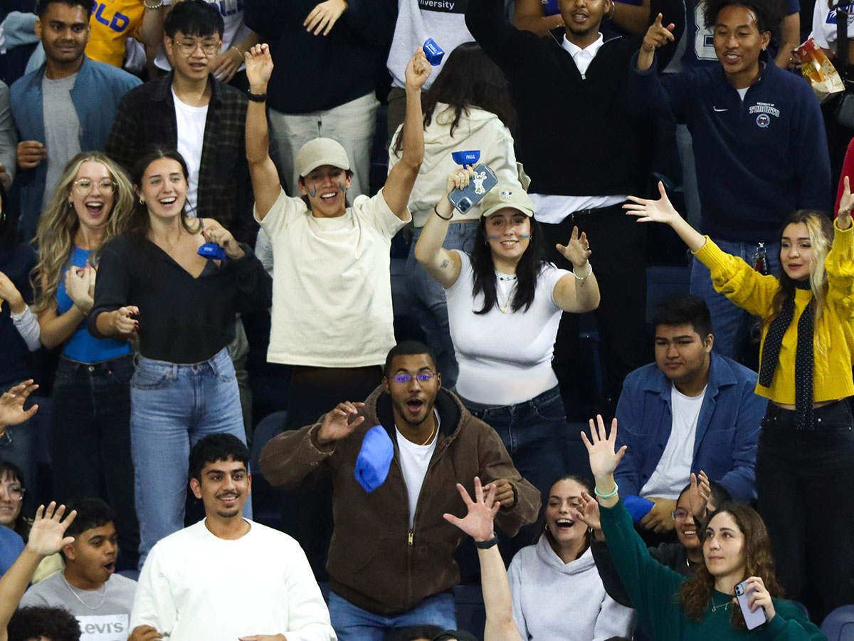 TMU fans cheering in the stands