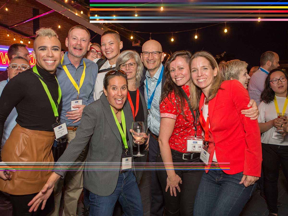 Group of alumni socializing at an event.