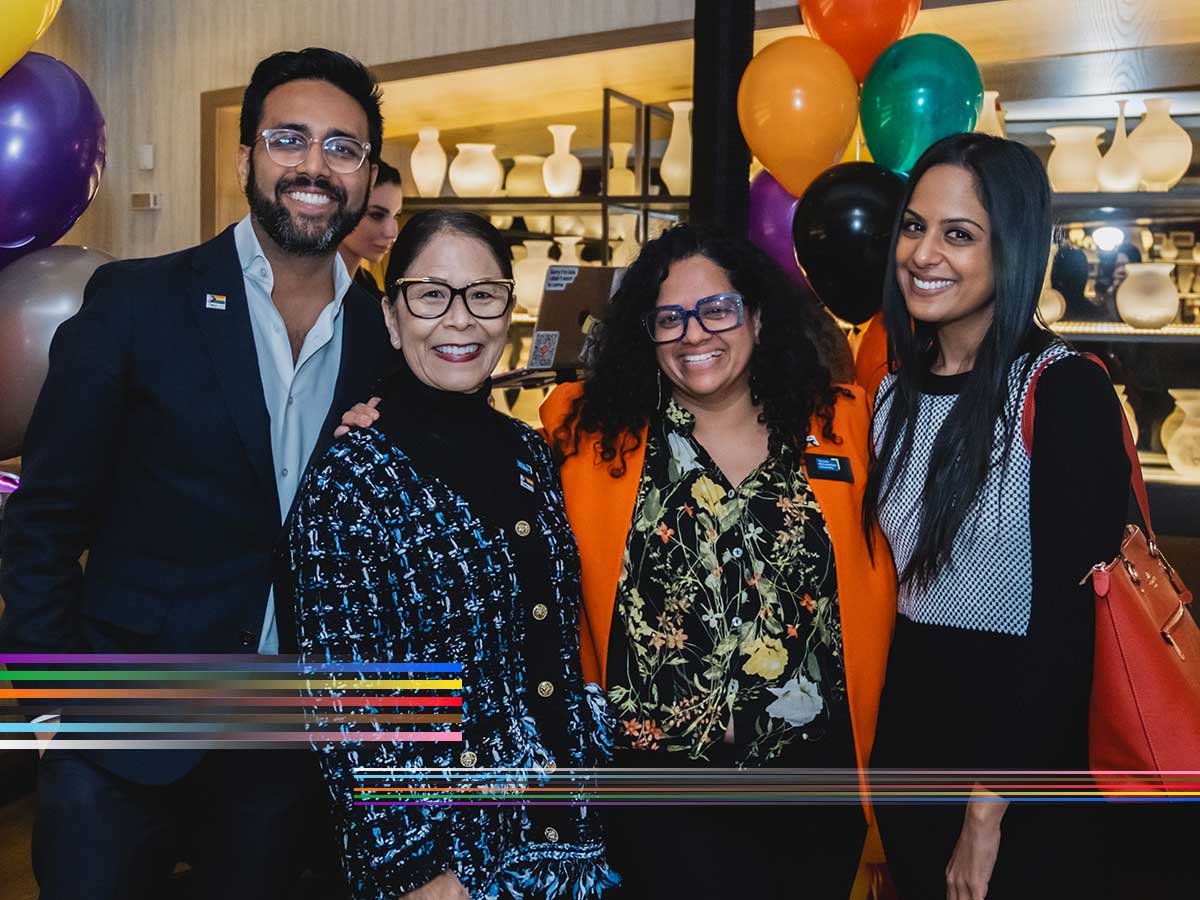 Group of alumni socializing at an event.