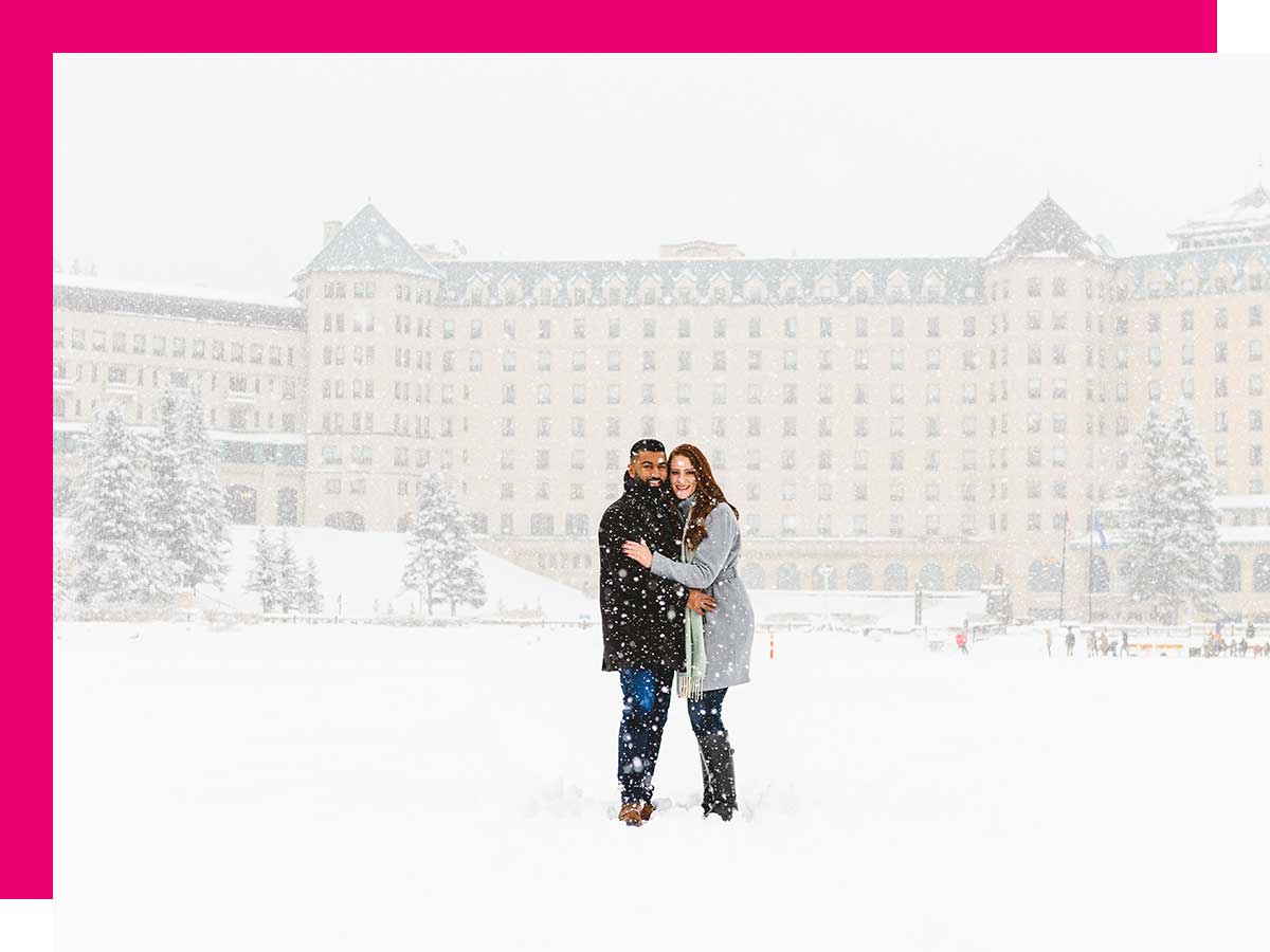 Bailey Parnell and Hamza Khan standing outside in a snowy landscape.