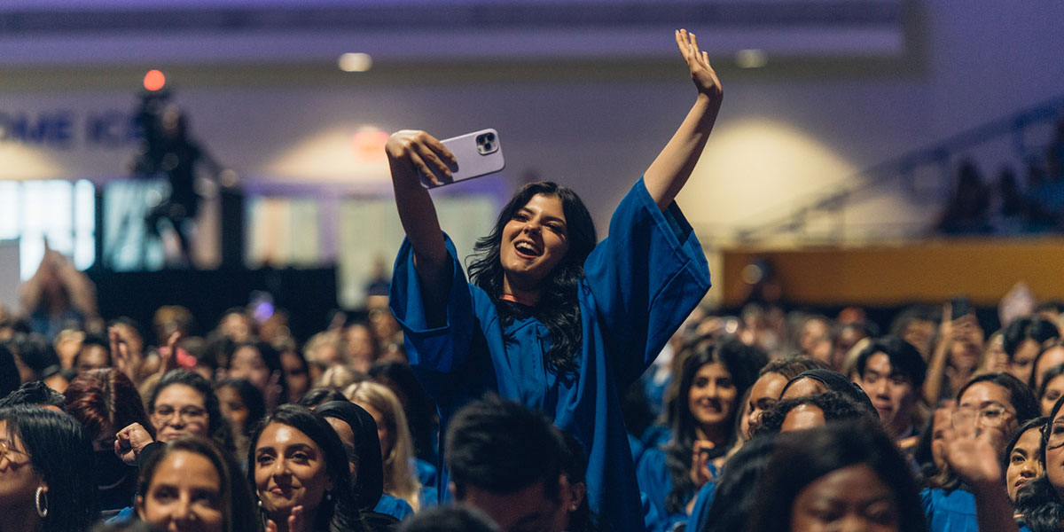 Graduate taking a selfie at convocation