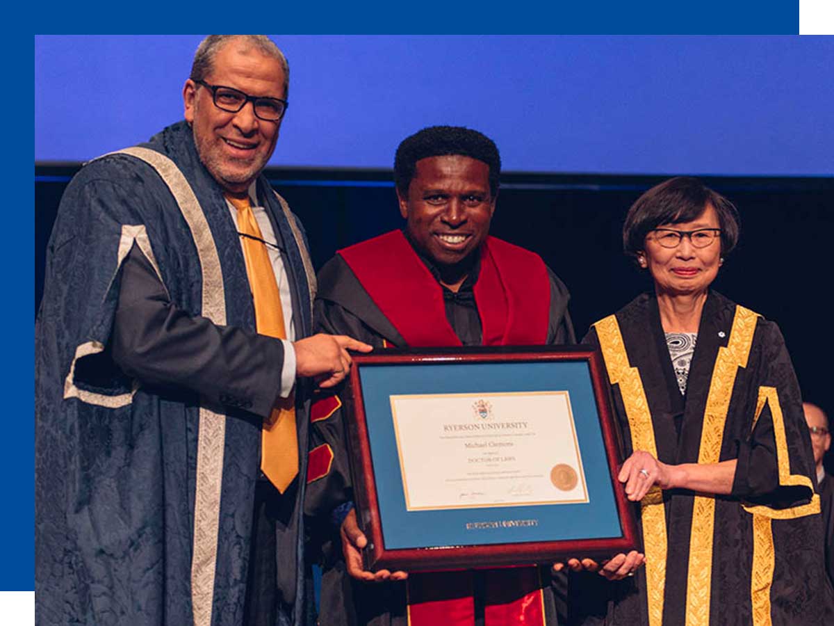 TMU President and Vice-Chancellor Mohamed Lachemi, Honorary Doctorate recipient and Canadian Football Hall of Famer Michael “Pinball” Clemons and Chancellor Janice Fukakusa.