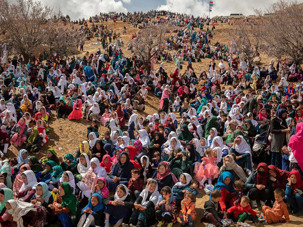 Hundreds of women, in their best dresses and wearing makeup, attend the Nowruz celebration in the village of Nalij, in the Miramor district in Daikundi, March 21, 2021. Photo by Kiana Hayeri