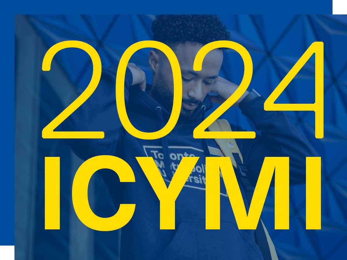 A man adjusting the hood of his sweater while looking down, with ICYMI superimposed on top