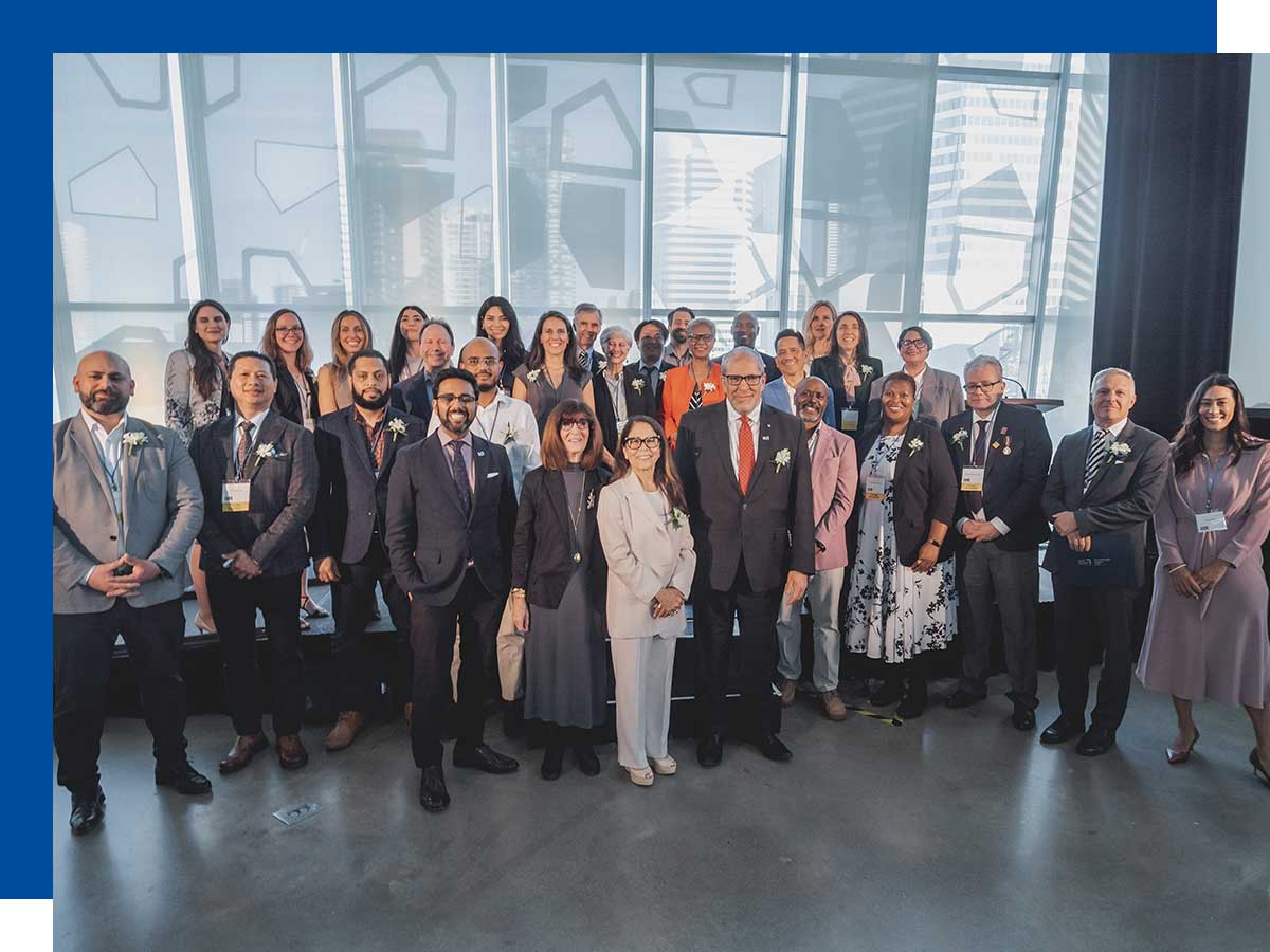 Outstanding Volunteer Award recipients pose alongside TMU senior leadership at the awards ceremony.