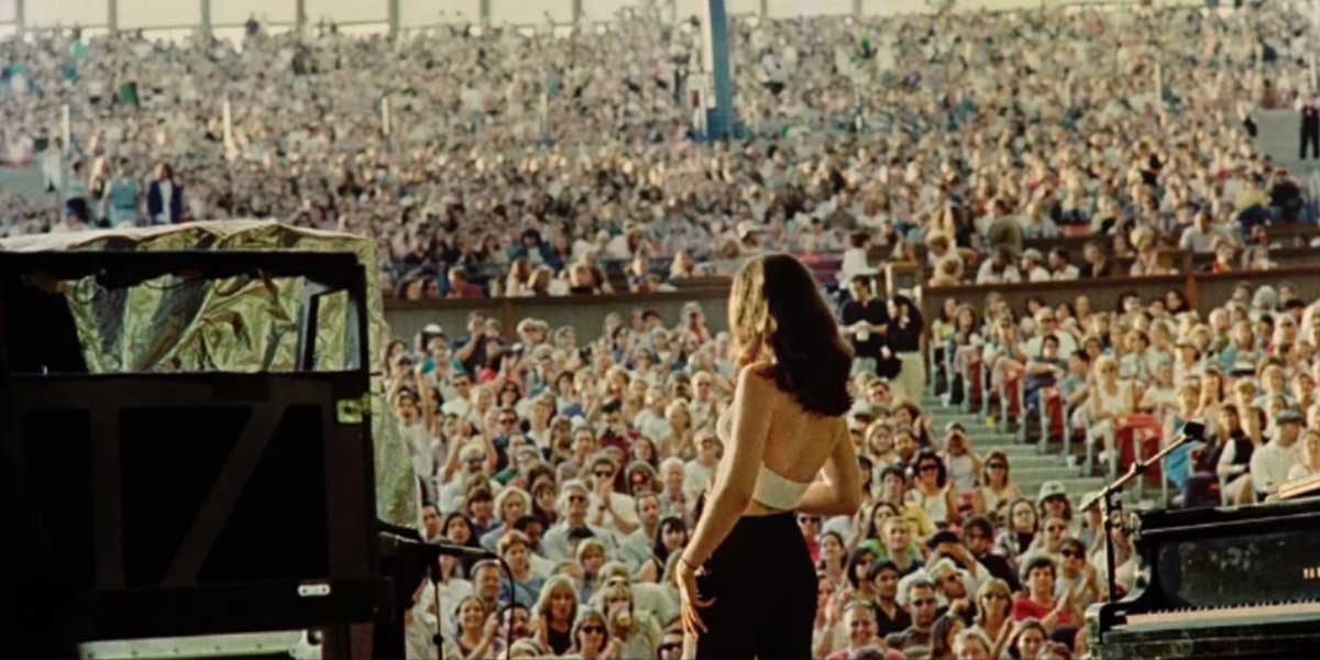 Film still looking out from onstage into the audience at Lilith Fair. Image Credit: Ally Pankiw