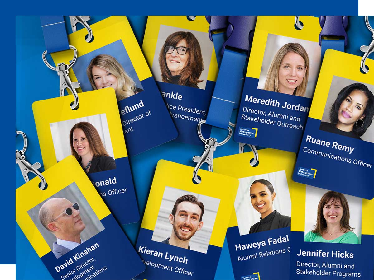 Sample badges of staff members laid out.