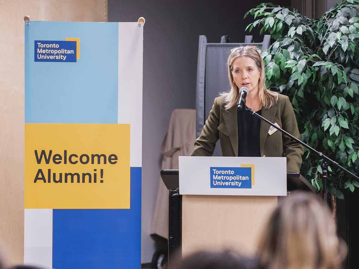 Event organizer delivers opening remarks.