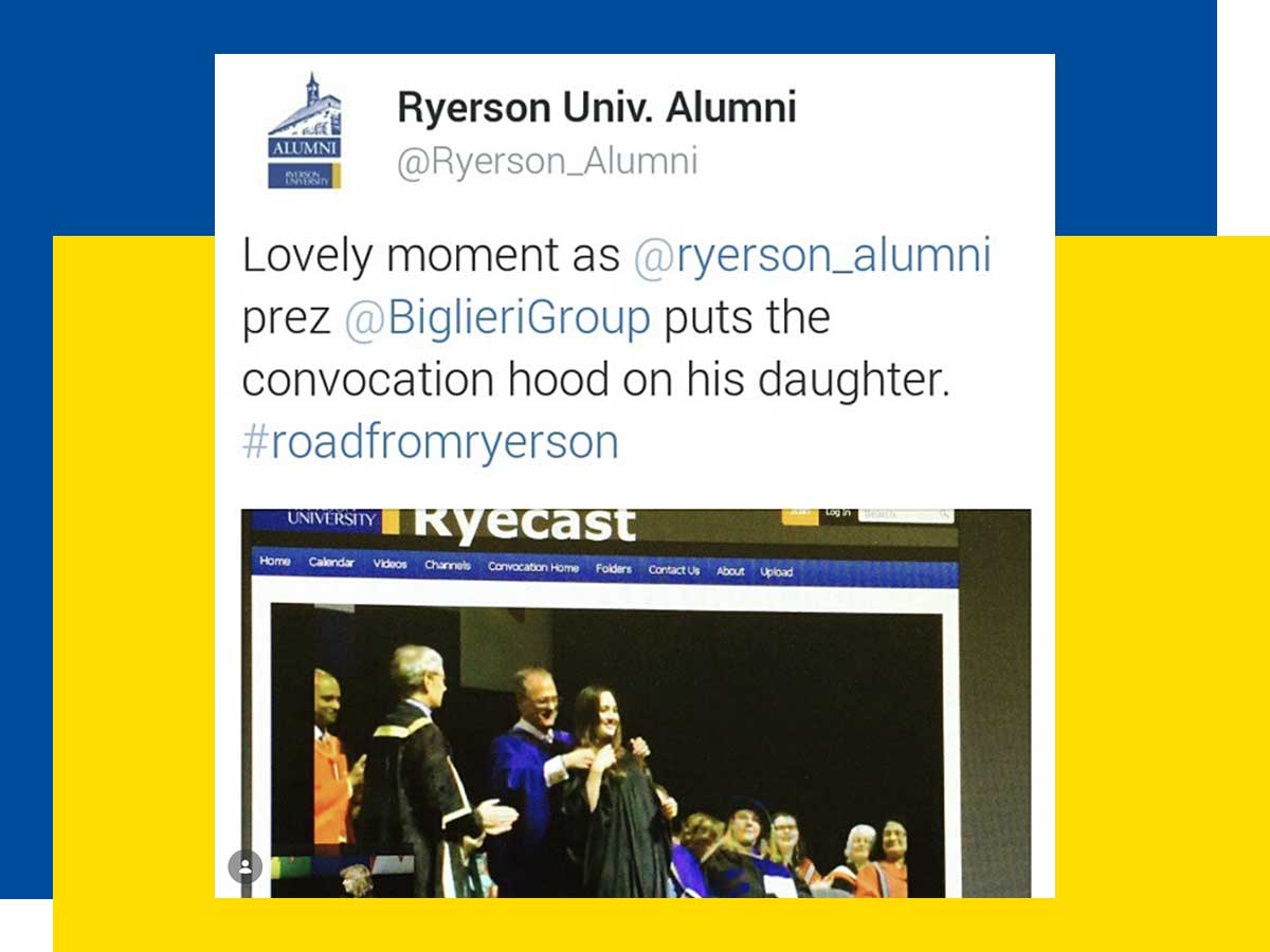 A screenshot of a tweet from 2015 which includes a photograph of a man placing a graduation hood over a woman on stage.