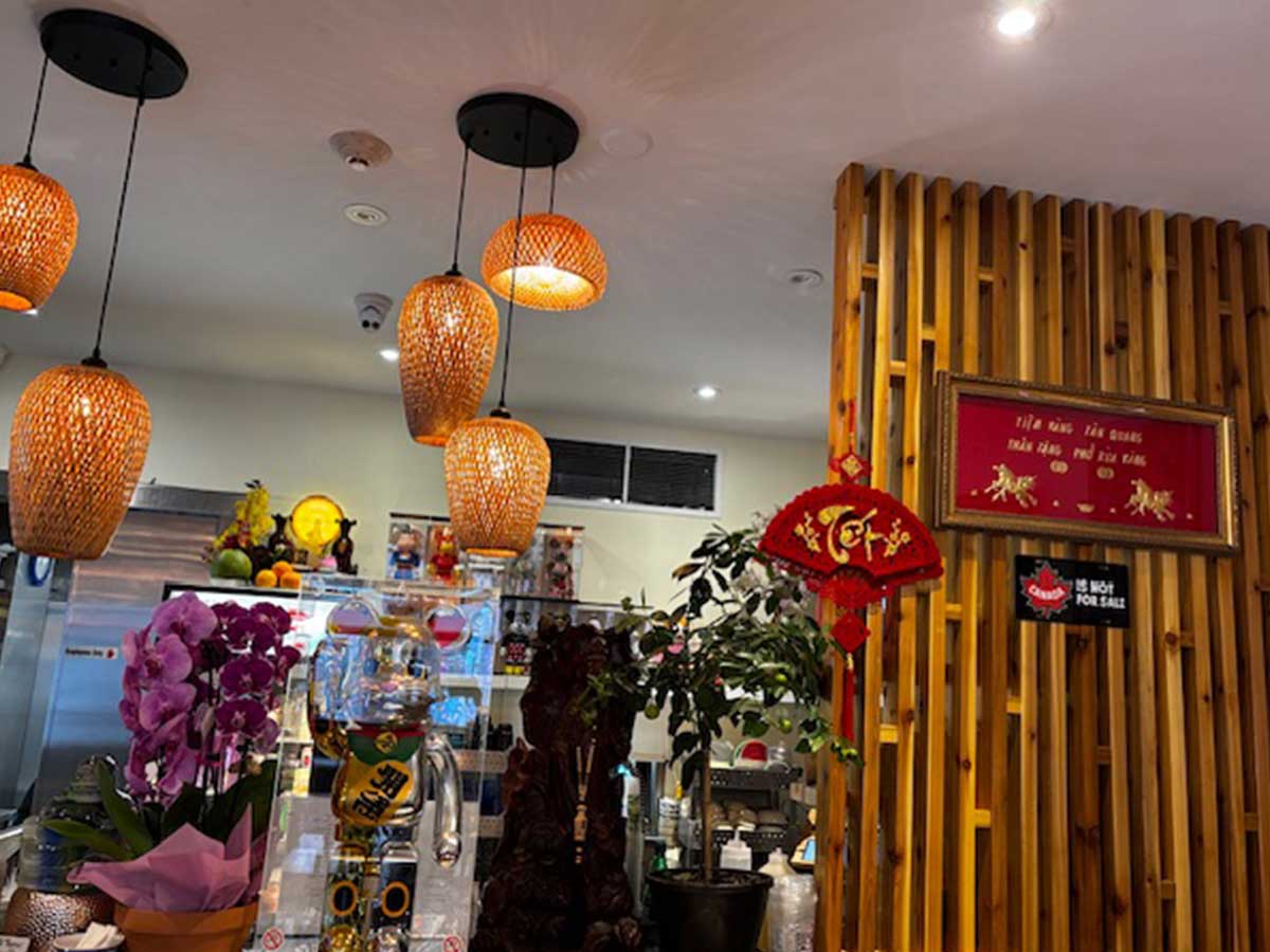 Lunar New Year decorations hanging inside of a restaurant