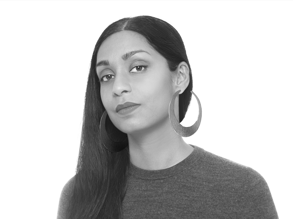 Black and white portrait of Erandi de Silva. 