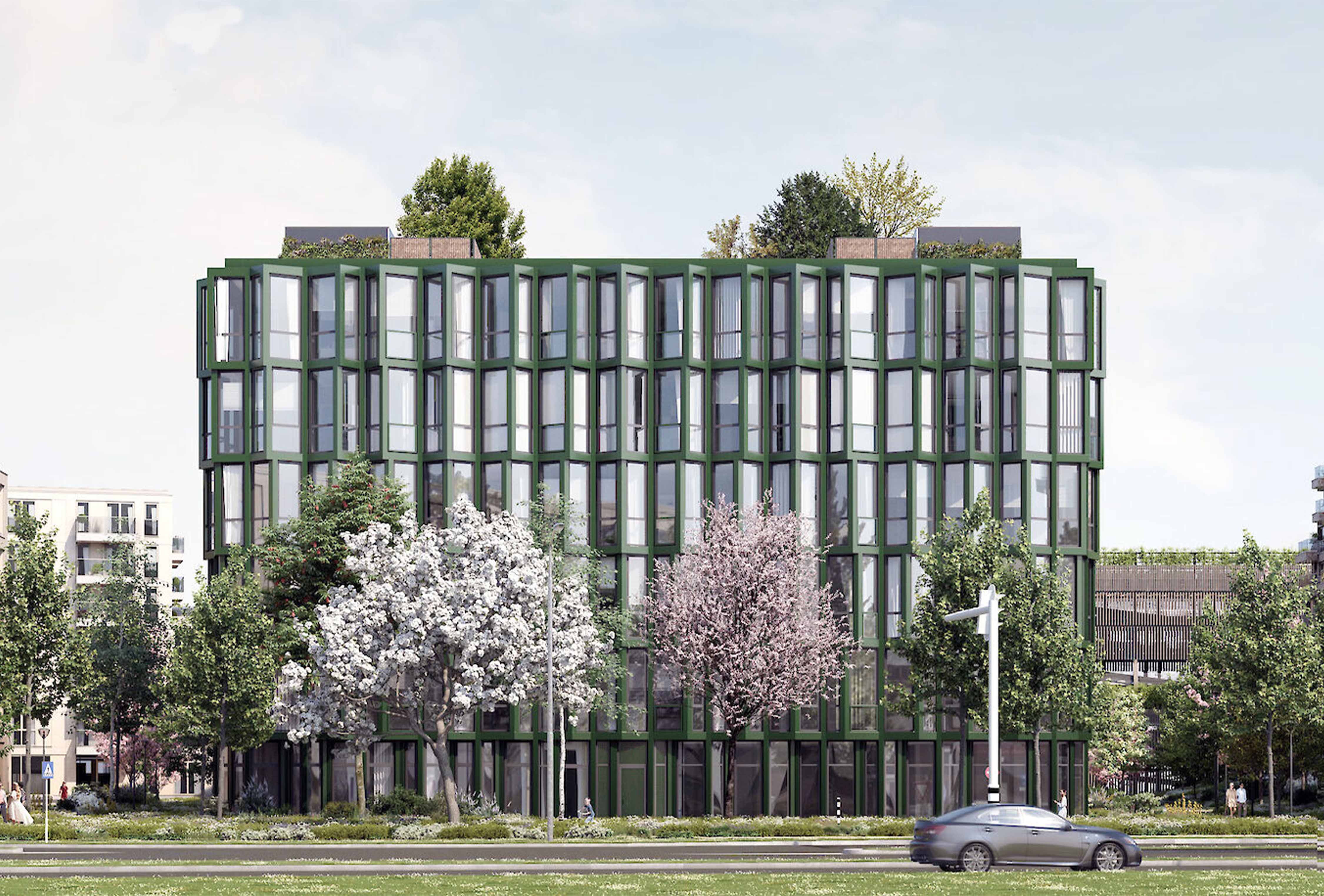 Exterior render of a residential tower in Haarlem, formerly the Fluor office building. A green building with glass windows sits on a quiet street. Photograph courtesy of Elephant. 