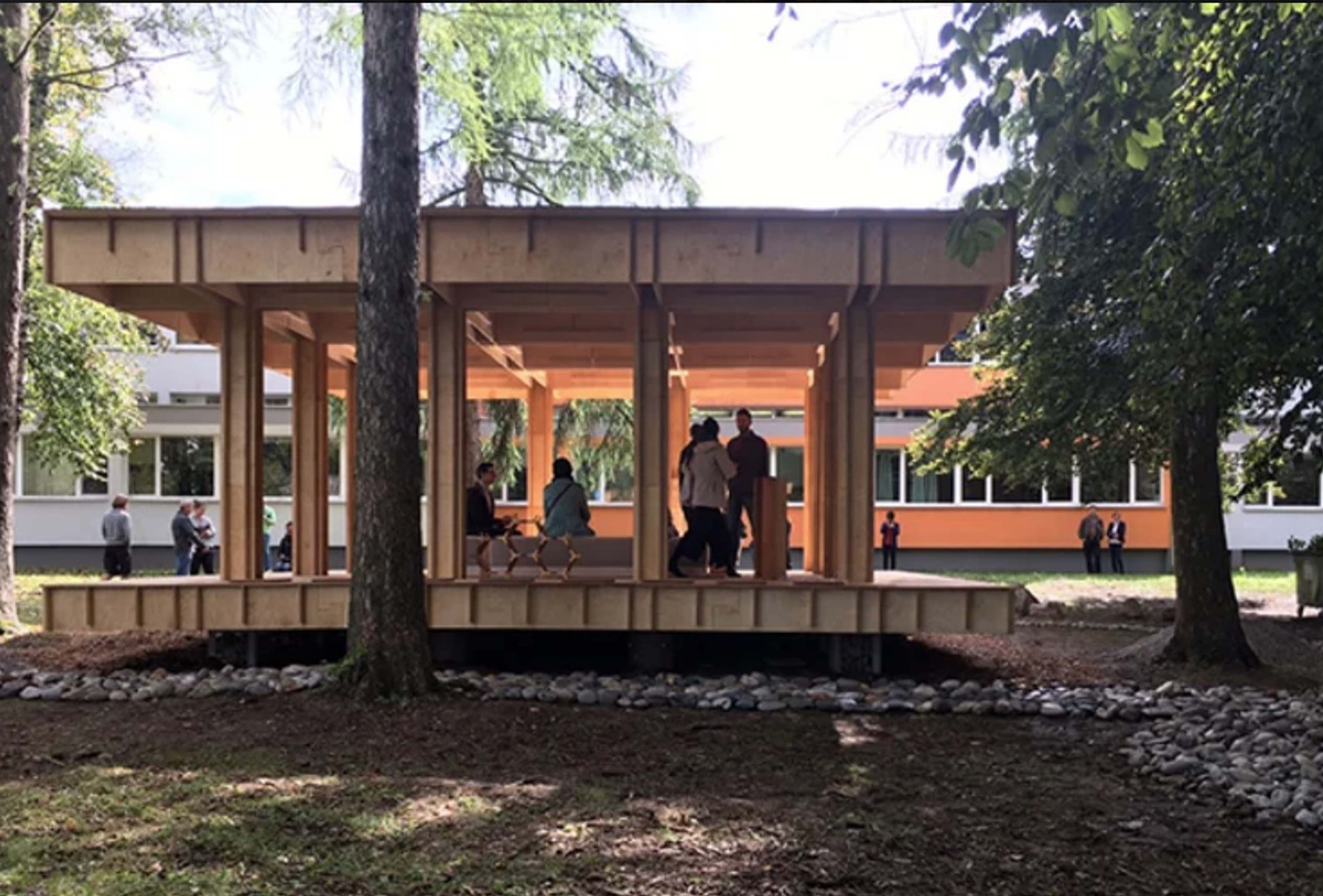 Exterior of the Slovenia Community Pavilion within a forest. Courtesy of Kobayashi Maki Design Workshop. 