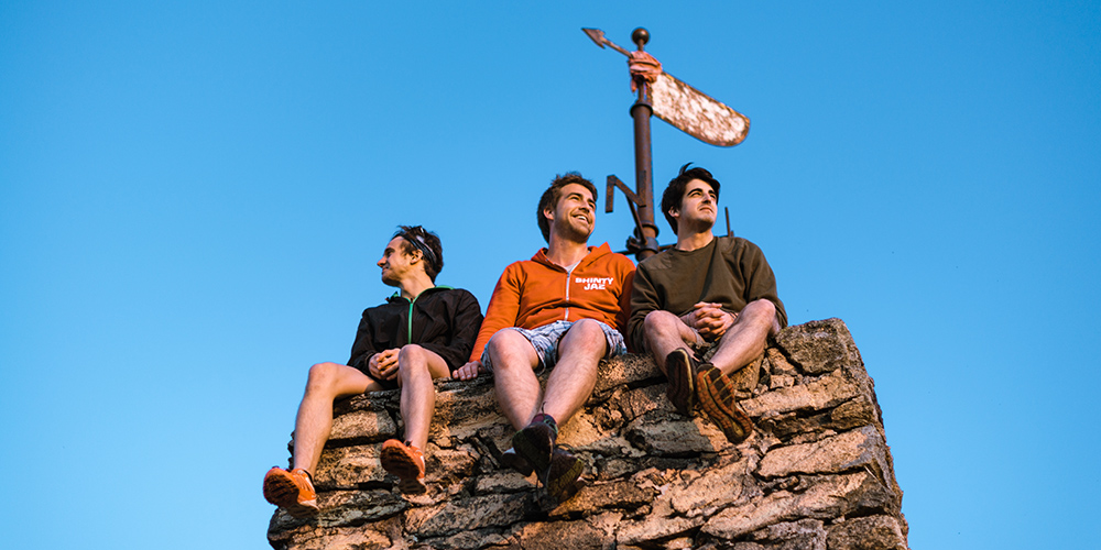 Students sitting on a rock in Bergen