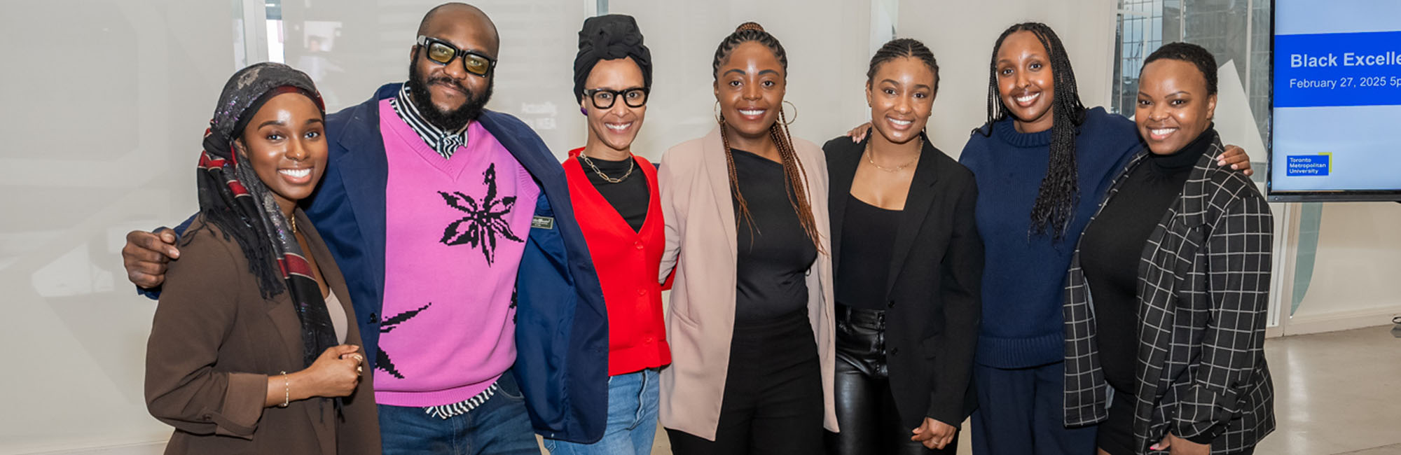 A TMU student using their laptop to view data visualizations