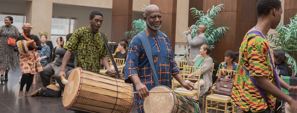 Drummers perform at the post-doctoral welcoming ceremony