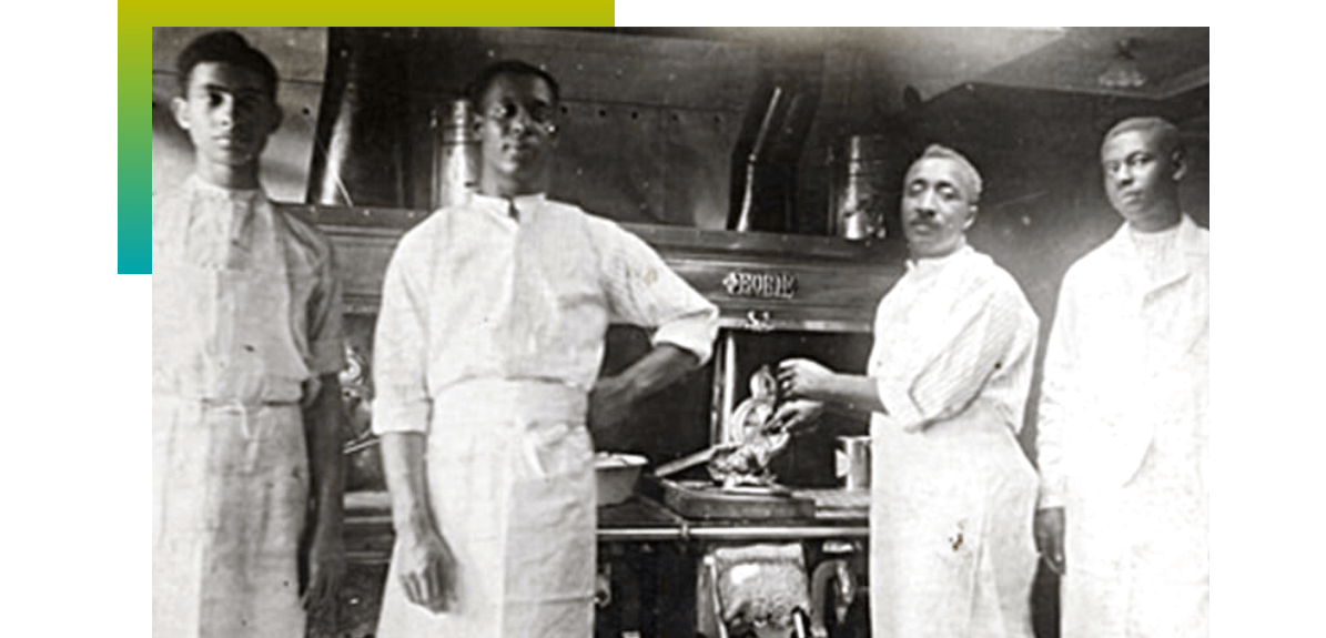 4 Black men working in a kitchen in ~1950s