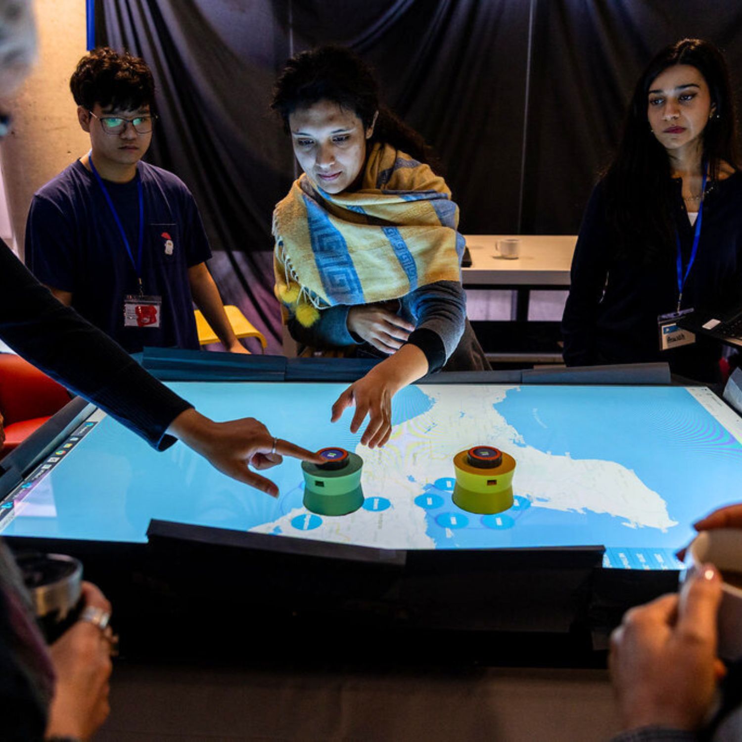 Two researchers speaking among themselves